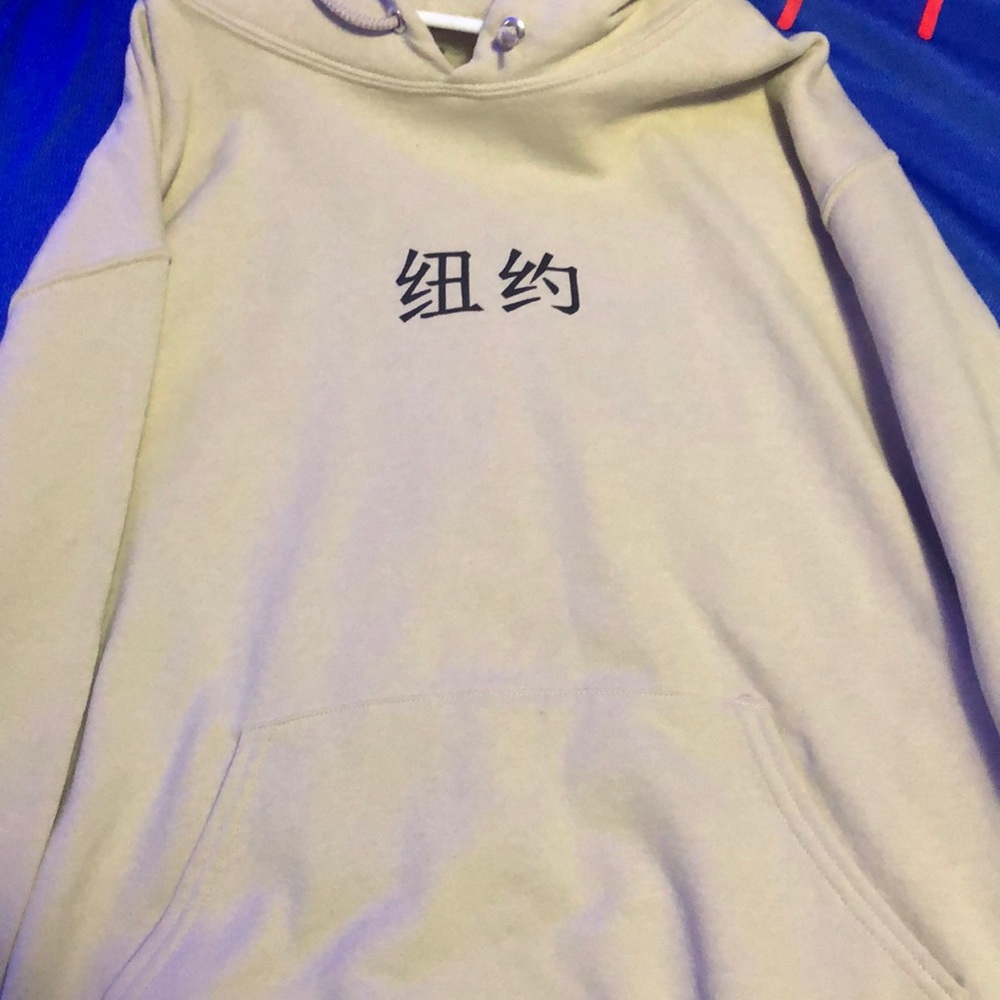 A sweater that had Chinese symbols